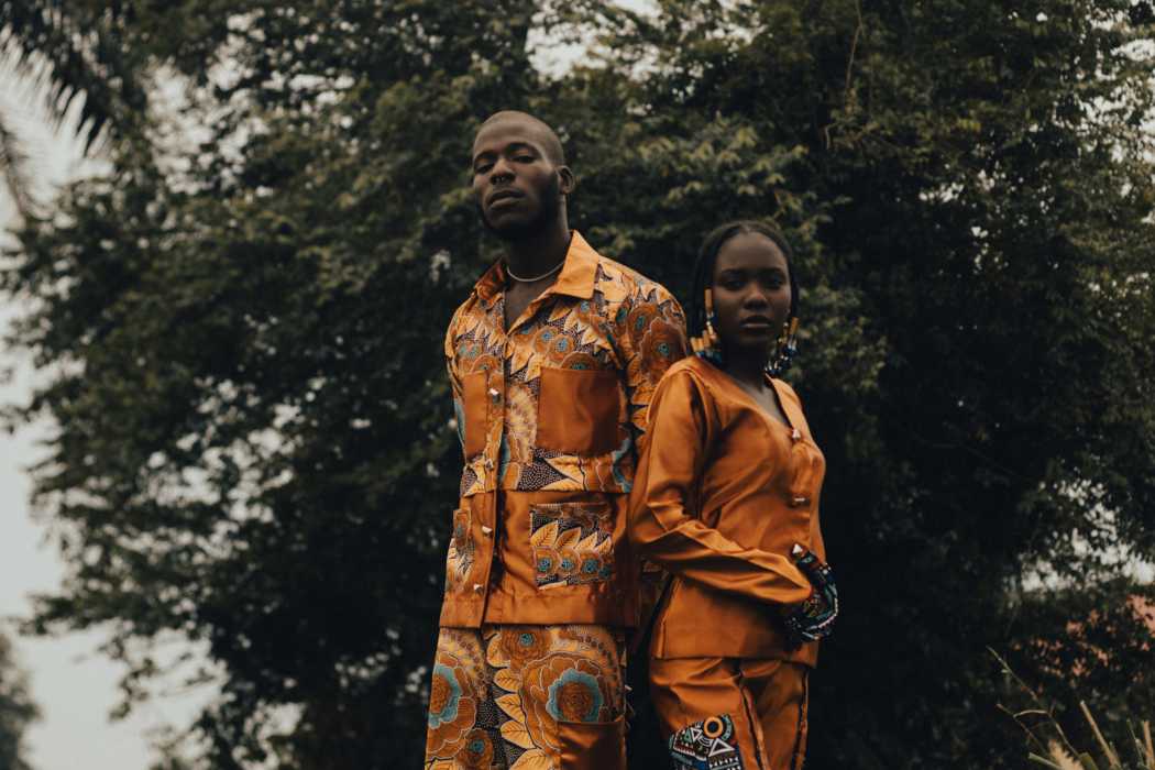 Male and female couple modeling african outfits